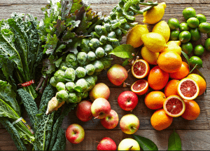 a group of fruits and vegetables on a wood surface Healthy Weight Loss Diets Wooburn Green